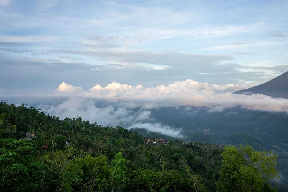 Breathtaking view of mountains and clouds in Bali, Indonesia during daytime.