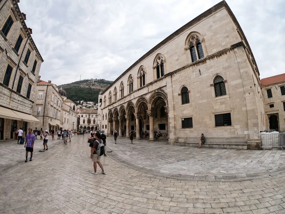 Explore the lively streets of Dubrovnik's Old Town, featuring historical architecture and vibrant street life.