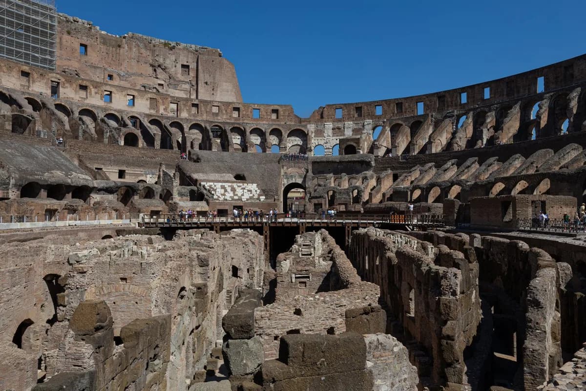 Explore the ancient Roman architecture of the Colosseum, a renowned world heritage site, in Rome, Italy.