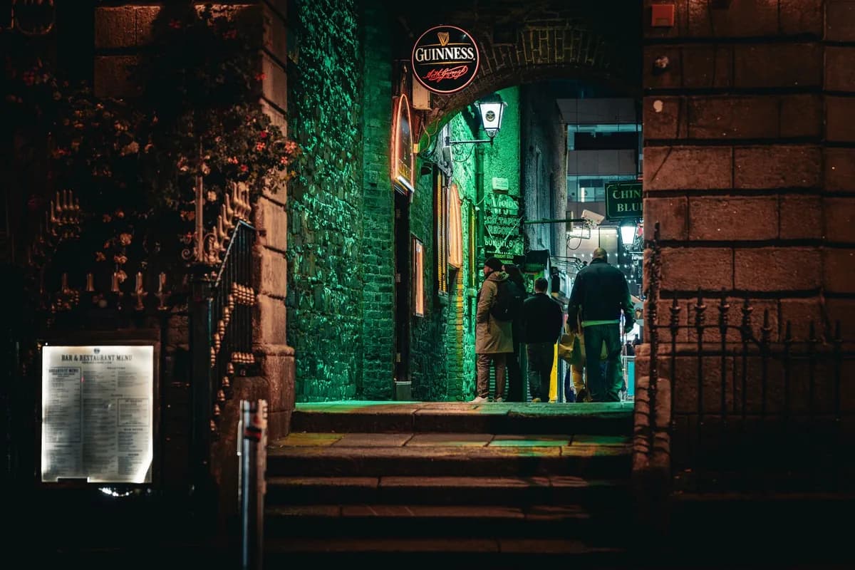 People enjoy Dublin's vibrant nightlife in the iconic Temple Bar area.
