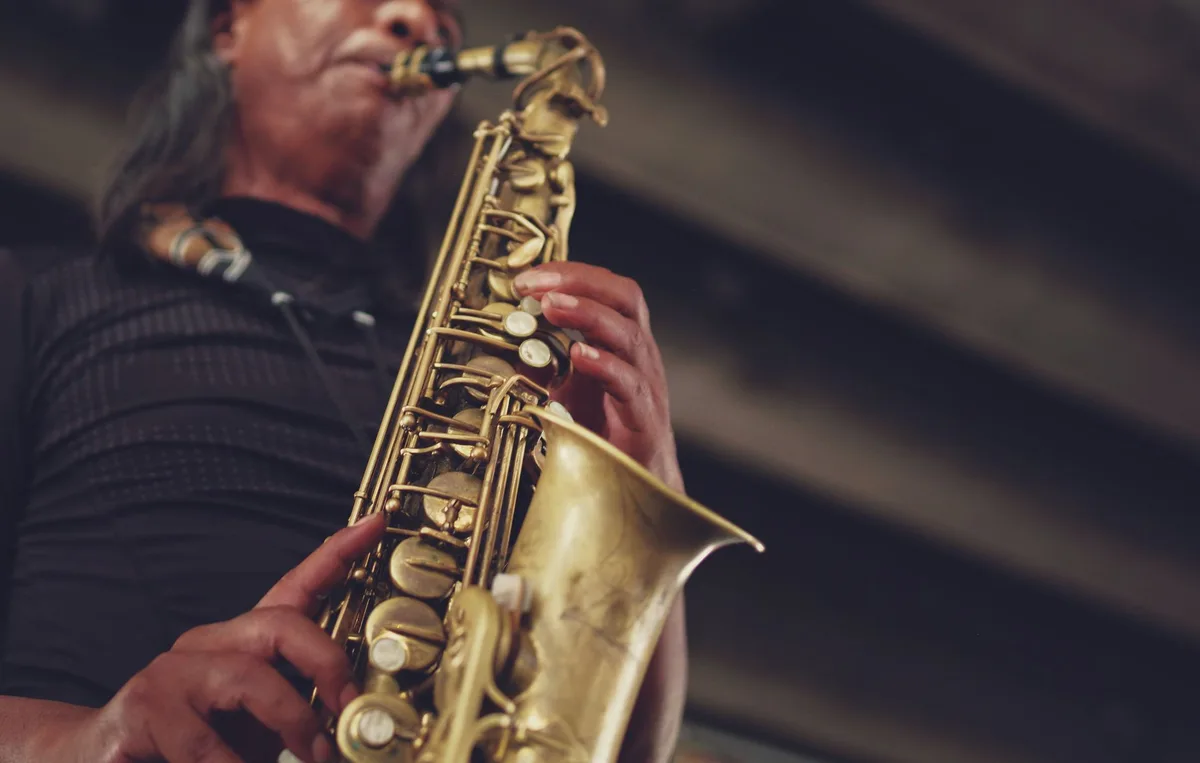A jazz musician performing on saxophone.