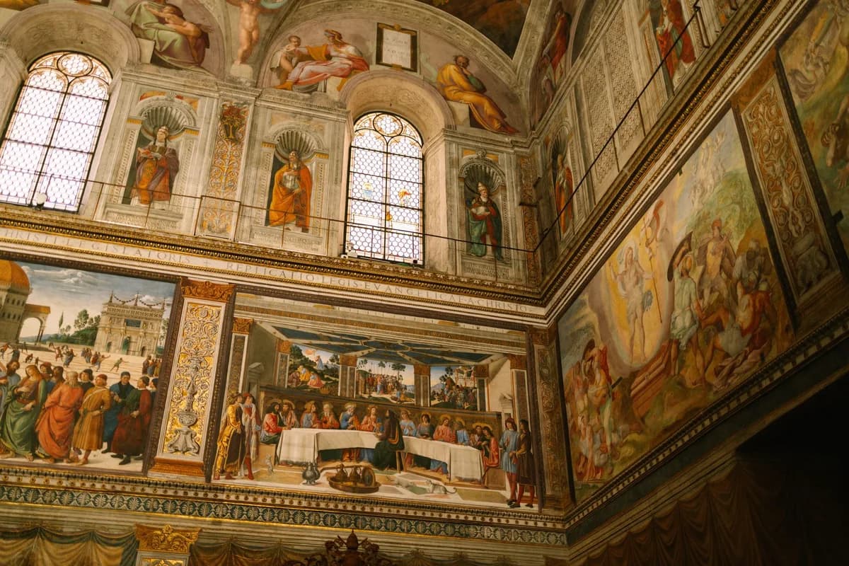 Detailed view of frescoes in the historic Sistine Chapel, Vatican City.