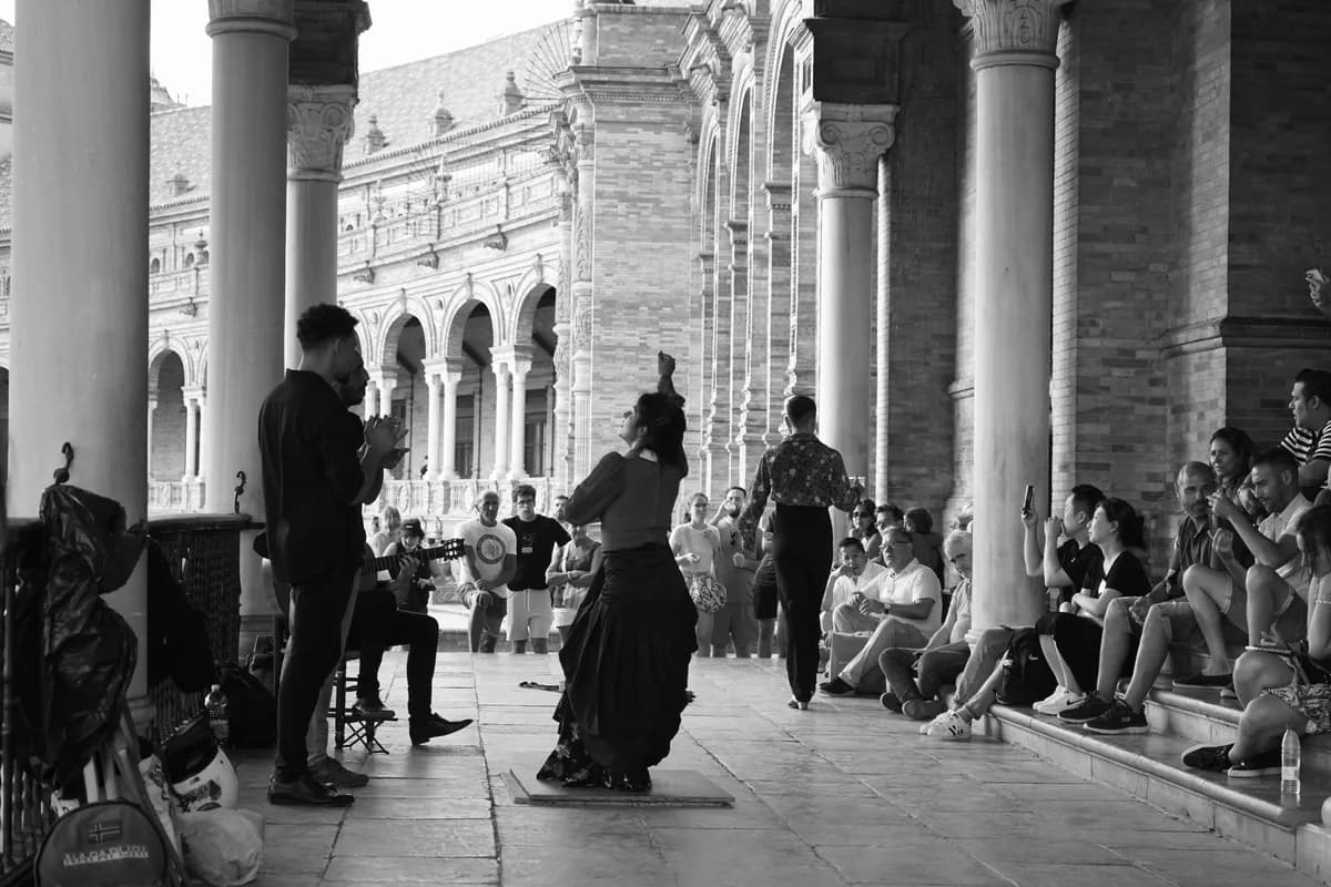 Traditional flamenco dancers performing in Plaza de España, Seville, Spain.