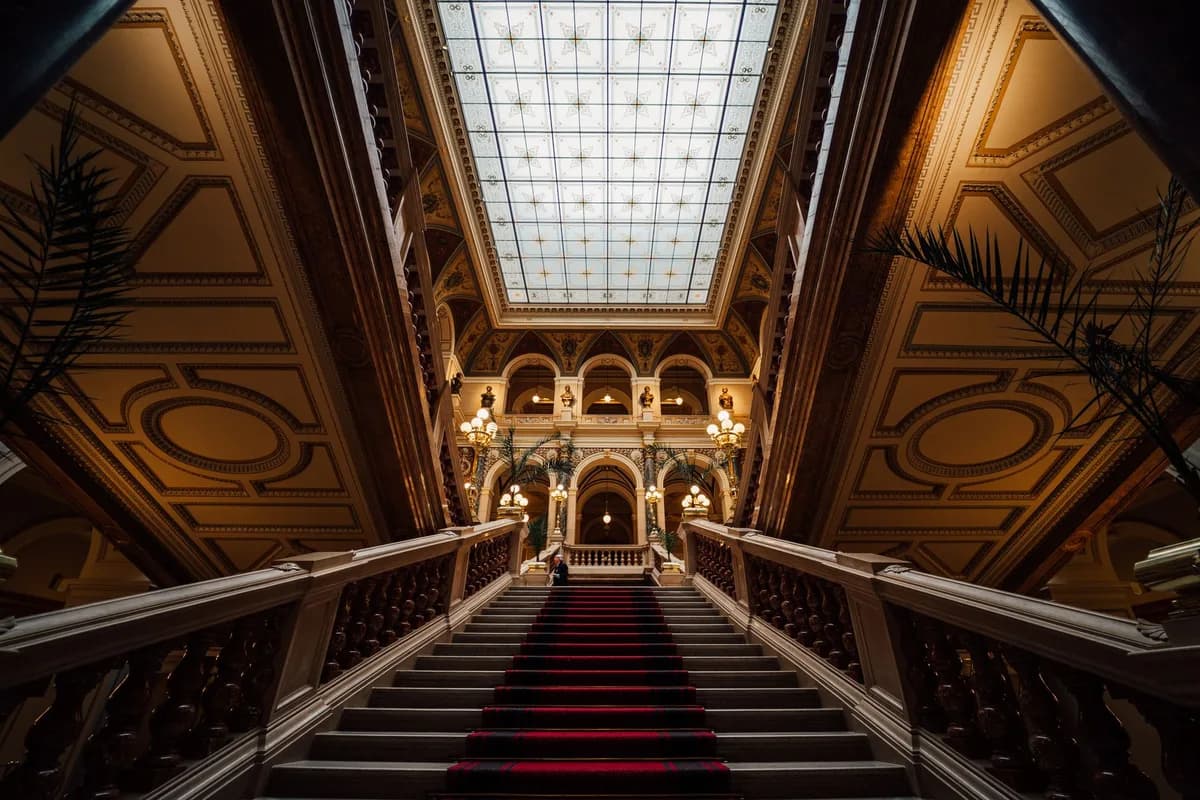 Explore the grand Neo-Renaissance interior of Prague's National Museum, showcasing luxurious design and architecture.